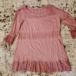 Pink blouse with ruffled long sleeves